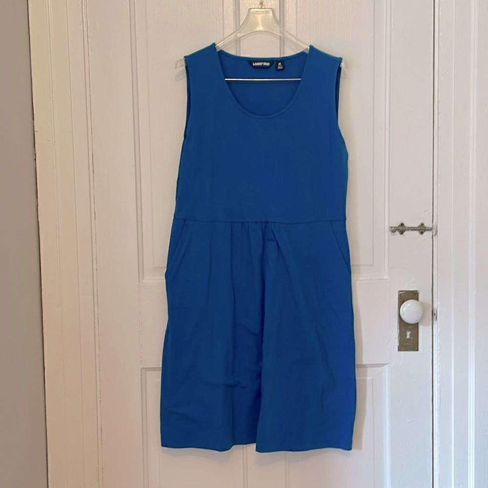 Sleeveless teal dress with pockets NWOT